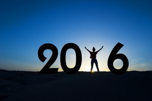 2016, silhouette of a woman standing in the sun